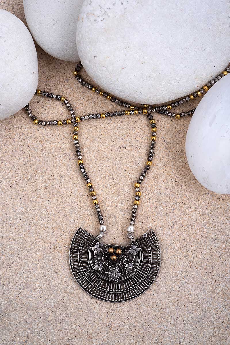 jewellry displayed on rocks